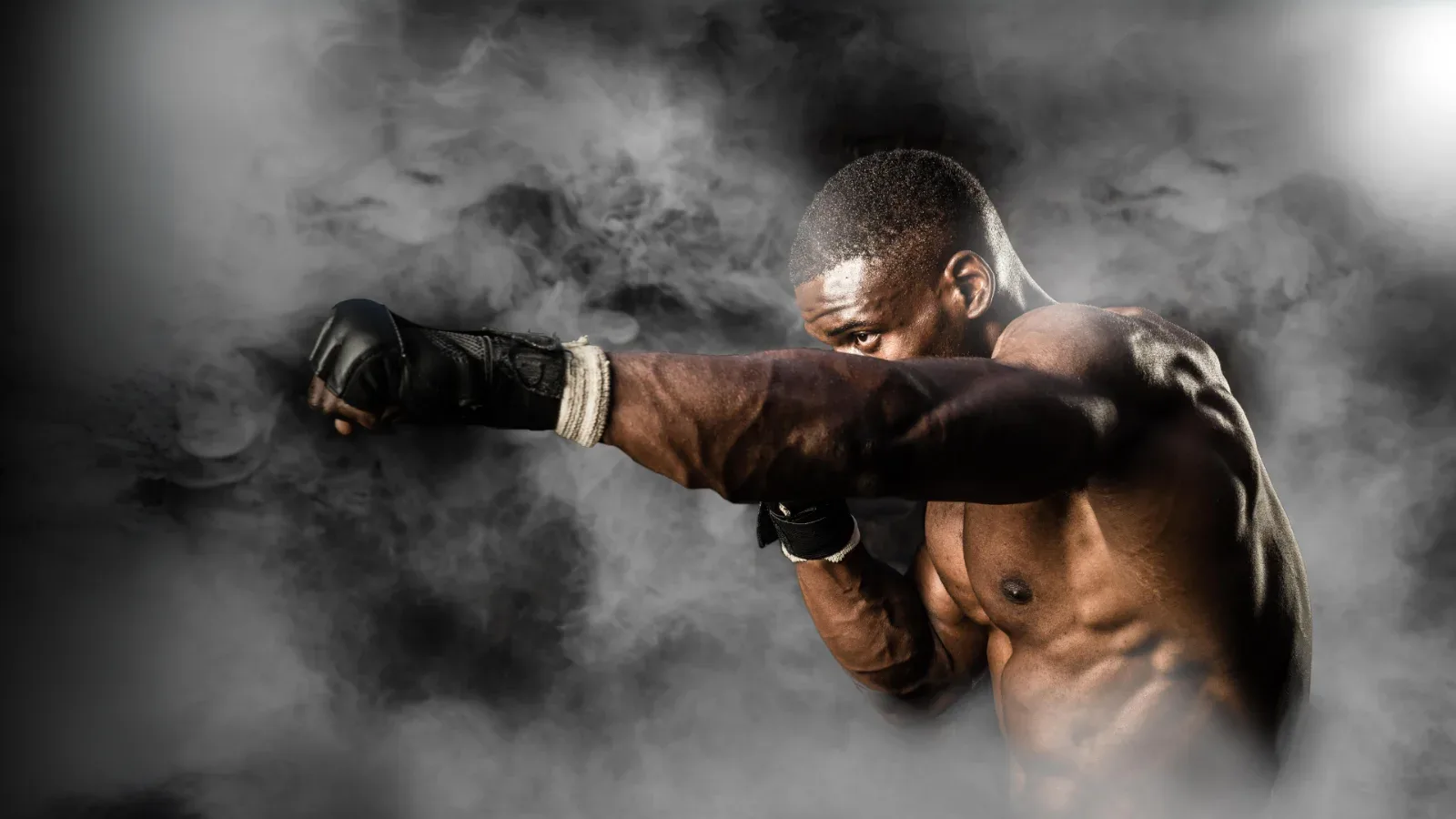Boxer in smoke boxing