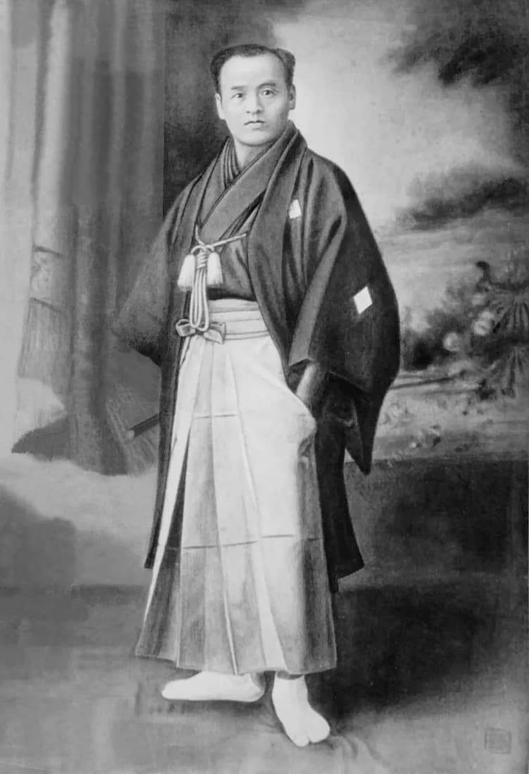 Portrait photograph of Takeda Sōkaku as a young man in 1888, in formal Japanese dress.