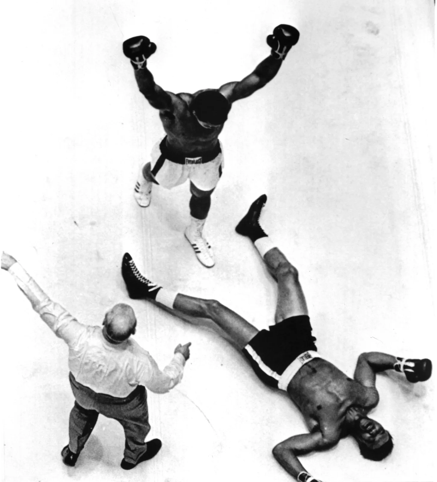 Muhammad Ali stands over the fallen Cleveland Williams at the Houston Astrodome in 1966 as the referee moves in.