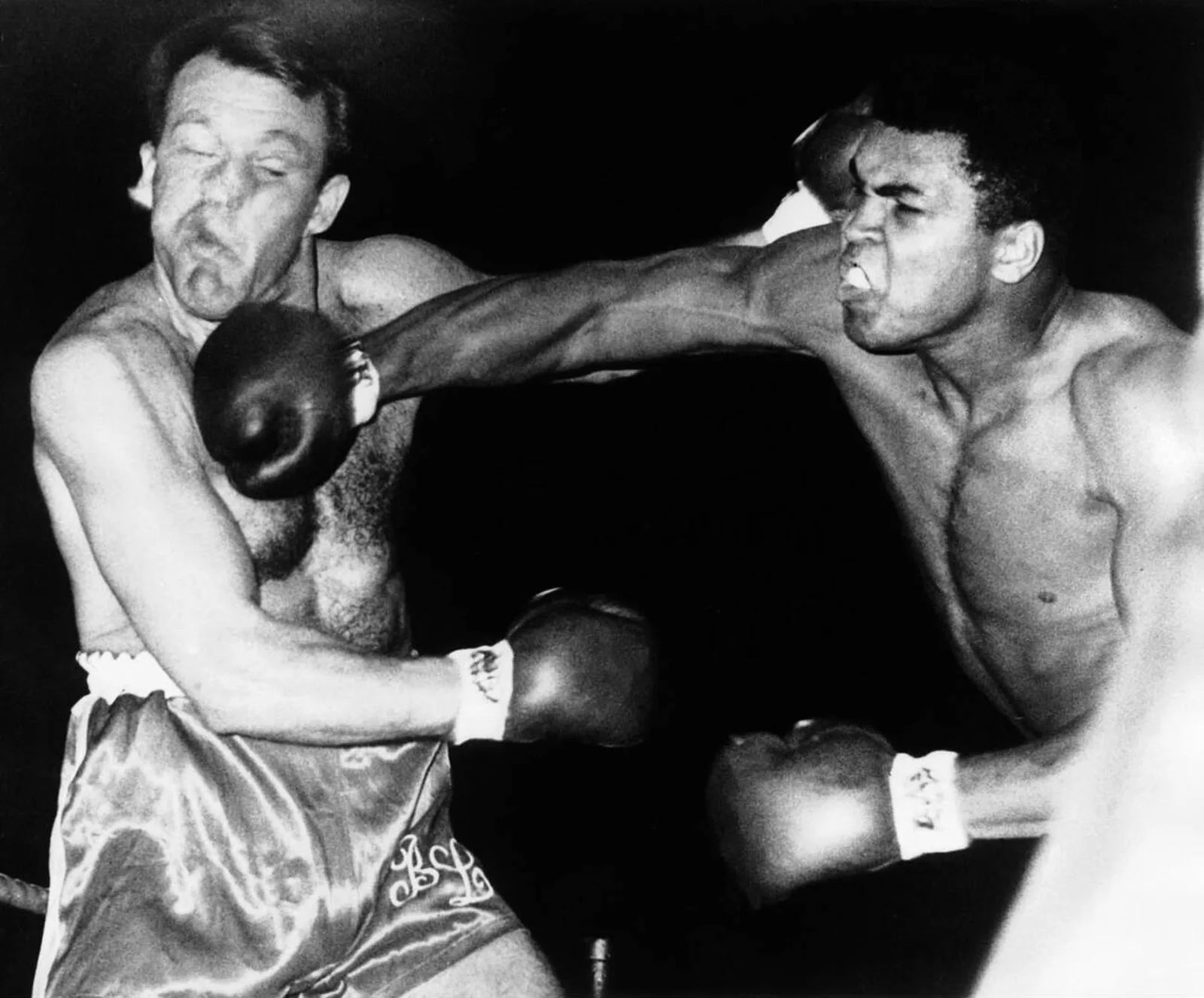 Muhammad Ali, gloves up, faces the British heavyweight Brian London in a ring at Earls Court, London, in 1966.