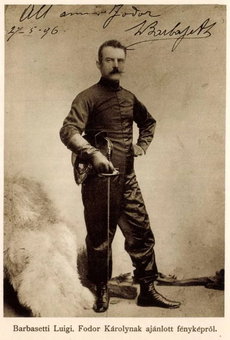 Photograph of Luigi Barbasetti, an elderly fencing master in a dark suit, in 1929.