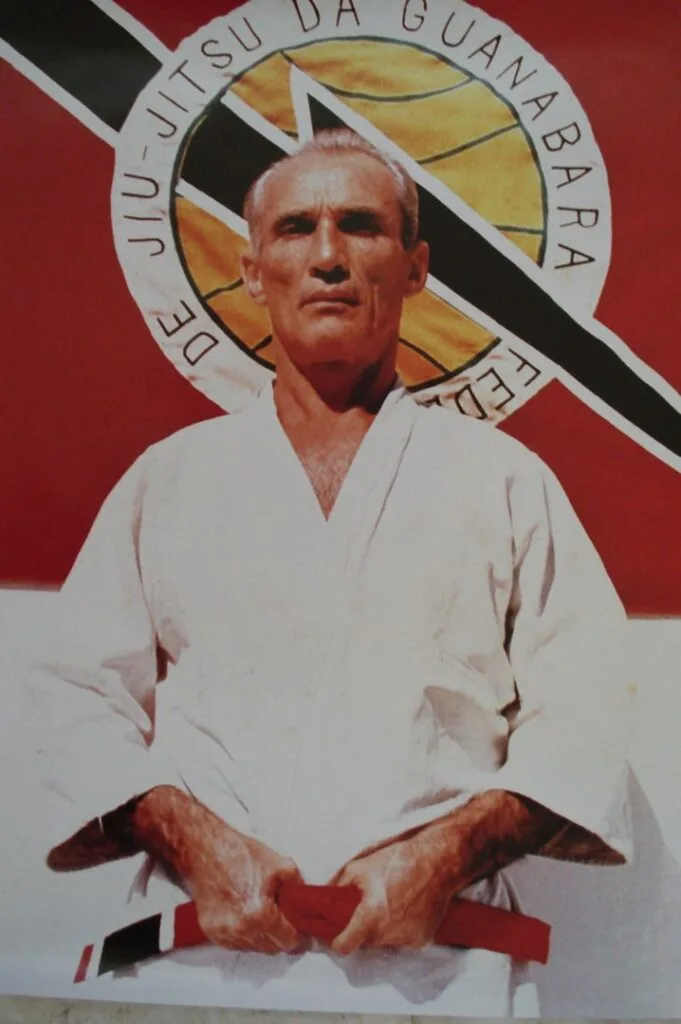 Hélio Gracie in 2002, an elderly man in a white gi, photographed at the academy.
