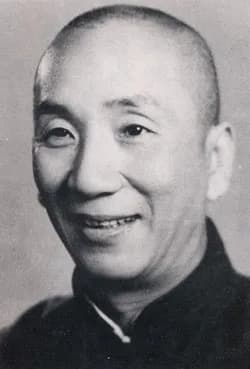 Portrait photograph of Ip Man in later life, in a dark Chinese jacket.