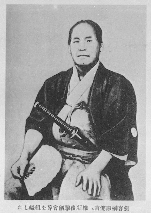 Portrait of Sakakibara Kenkichi, a Meiji-era swordsman, seated in formal Japanese dress.