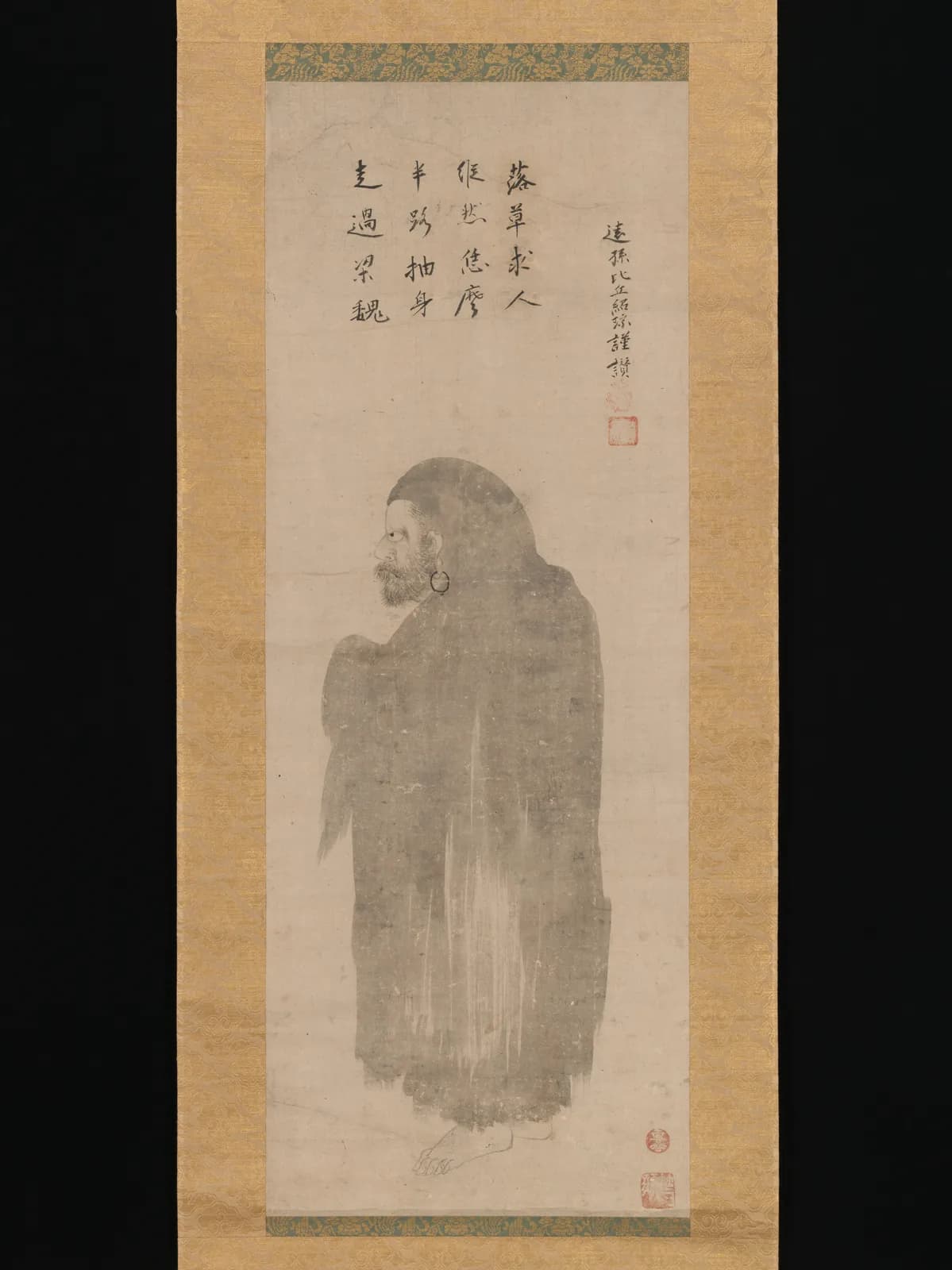 Ink painting of Bodhidharma, the bearded Buddhist patriarch, wrapped in a robe, by the Japanese painter Unkoku Tōgan.