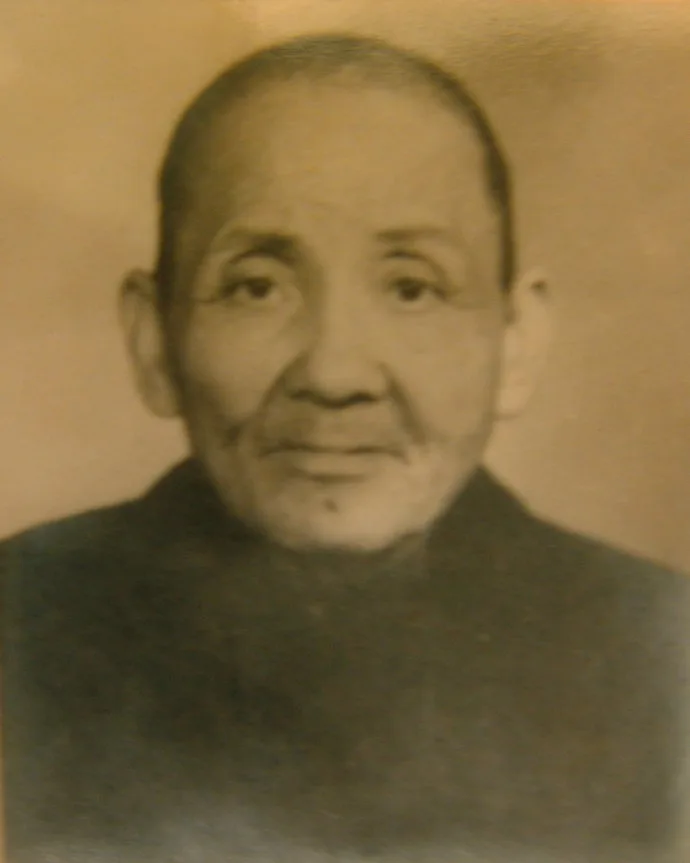 Portrait drawing of Wong Fei-hung, the Foshan physician and Hung Ga master, with a queue and Qing-era jacket.