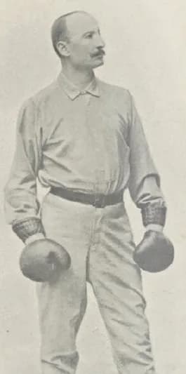 Photograph of Joseph Charlemont, an elderly man with a white beard, in 1899.