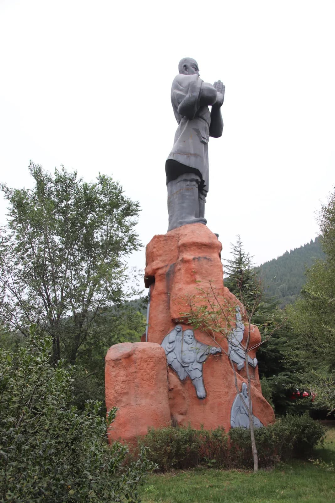 Statue of a monk in a fighting stance at the entrance of the Shaolin Temple in Dengfeng.